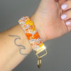 Groovy Orange Floral Scrunchie Wristlet Keychain